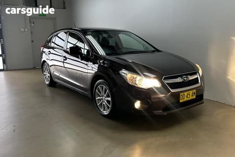 Purple 2012 Subaru Impreza Hatchback 2.0I-L (Awd)