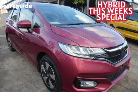 Red 2017 Honda Fit Hatchback (Hybrid)