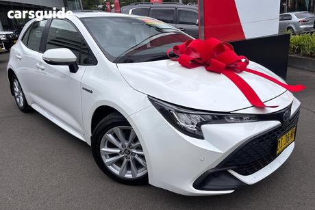 White 2023 Toyota Corolla Hatchback Ascent Sport Hybrid