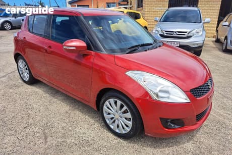 Red 2011 Suzuki Swift Hatchback Ga