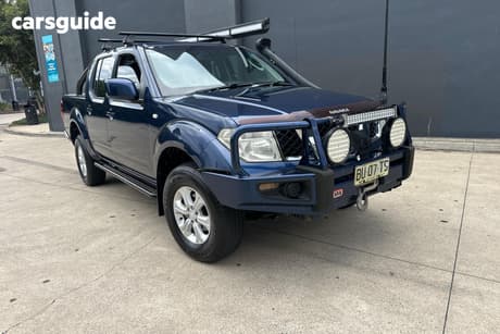 Blue 2010 Nissan Navara Dual Cab Pick-up St (4X4)