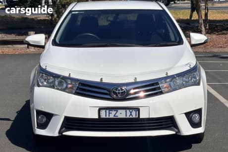 White 2016 Toyota Corolla Sedan Sx