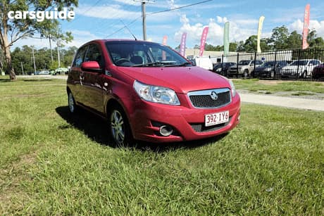 Red 2011 Holden Barina Hatchback