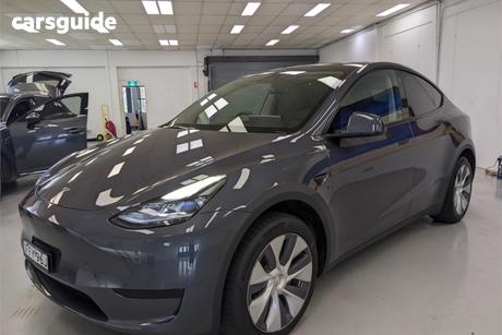 Grey 2024 Tesla Model Y Wagon Rear-Wheel Drive