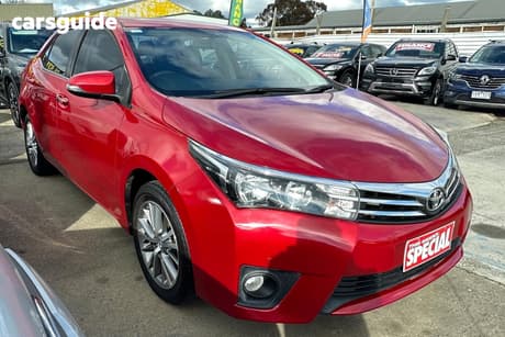 Red 2016 Toyota Corolla Sedan Sx