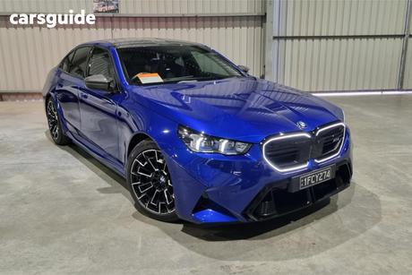 Blue 2024 BMW M5 Sedan