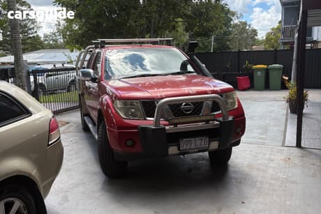 Red 2009 Nissan Navara Dual Cab Pick-up St-X (4X4)