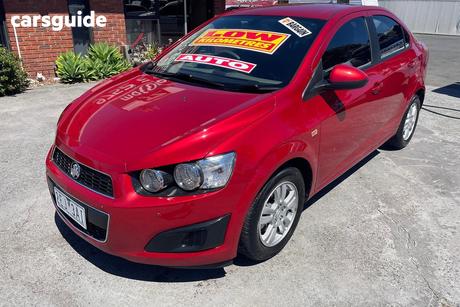 Red 2012 Holden Barina Sedan