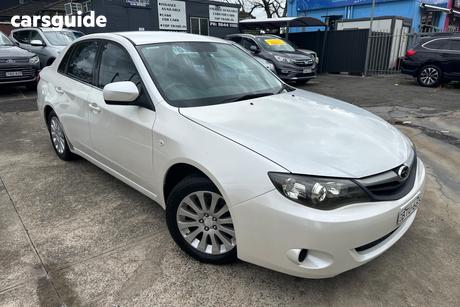 White 2010 Subaru Impreza Sedan R (AWD) MY11