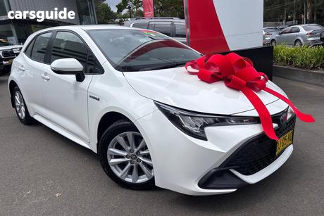 White 2023 Toyota Corolla Hatchback Ascent Sport Hybrid