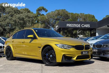Yellow 2017 BMW M3 Sedan Competition