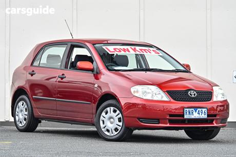 Red 2002 Toyota Corolla Hatchback Ascent Seca