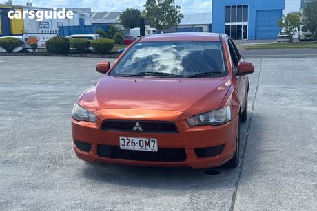 Orange 2011 Mitsubishi Lancer Sedan Sx