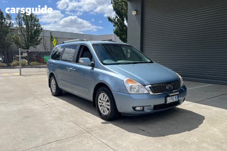 Blue 2011 Kia Grand Carnival Wagon Platinum