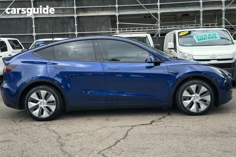 Blue 2024 Tesla Model Y Wagon Rear-Wheel Drive