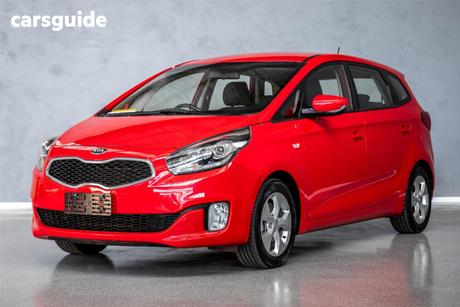 Red 2015 Kia Rondo Wagon Si