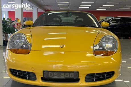 Yellow 2001 Porsche Boxster Roadster S