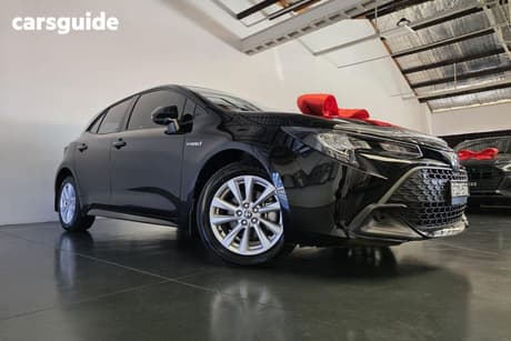 Black 2024 Toyota Corolla Hatchback Ascent Sport Hybrid