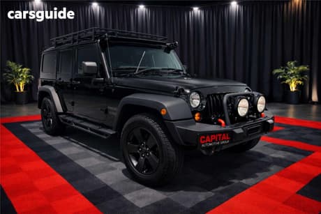 Black 2011 Jeep Wrangler Softtop Sport (4X4)