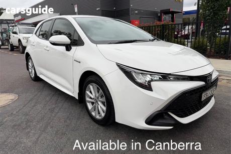 White 2023 Toyota Corolla Hatchback Ascent Sport Hybrid
