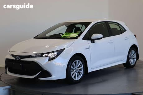 White 2023 Toyota Corolla Hatchback Ascent Sport Hybrid