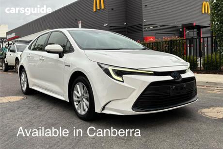 White 2023 Toyota Corolla Sedan Ascent Sport Hybrid