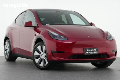Red 2023 Tesla Model Y Wagon Rear-Wheel Drive