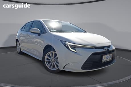 White 2023 Toyota Corolla Sedan Ascent Sport Hybrid