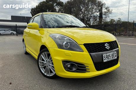 Yellow 2013 Suzuki Swift Hatchback Sport
