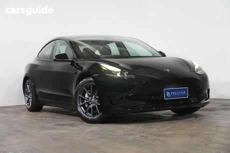 Black 2021 Tesla Model 3 Sedan Standard Range Plus Rwd
