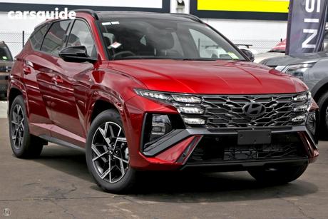 Red 2026 Hyundai Tucson Wagon Premium Hybrid (Awd)