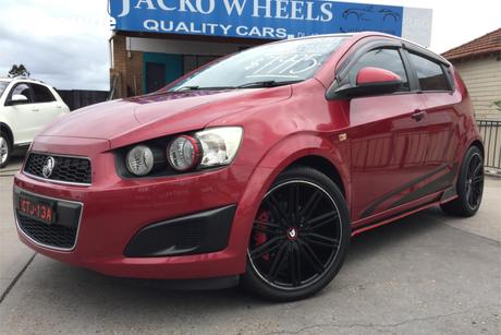 Red 2014 Holden Barina Hatchback Cd