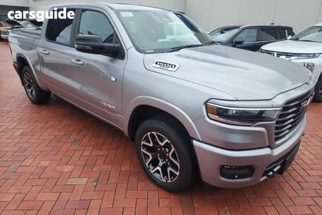 Silver 2025 RAM 1500 Crew Cab Utility Rebel Hurricane