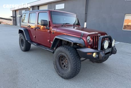 Red 2010 Jeep Wrangler Softtop Sport (4X4)