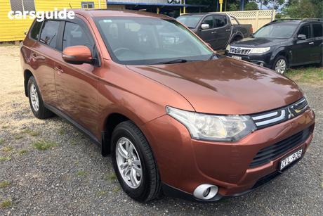 Orange 2012 Mitsubishi Outlander Wagon Ls (4X4)
