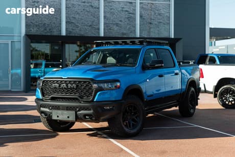 Blue 2025 RAM 1500 Crew Cab Utility Rebel Hurricane