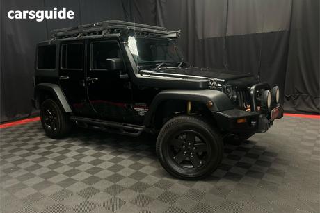 Black 2011 Jeep Wrangler Softtop Sport (4X4)