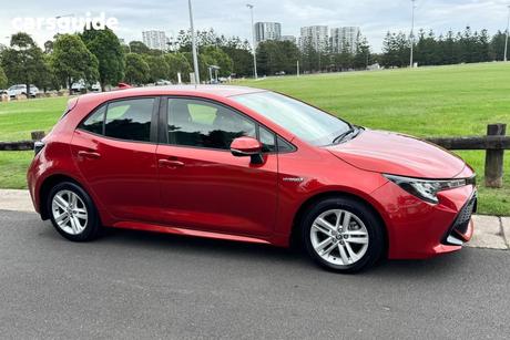 Orange 2020 Toyota Corolla Hatchback Ascent Sport + Navi (Hybrid)