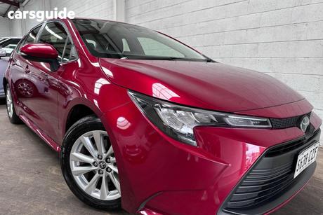 Red 2024 Toyota Corolla Sedan Ascent Sport
