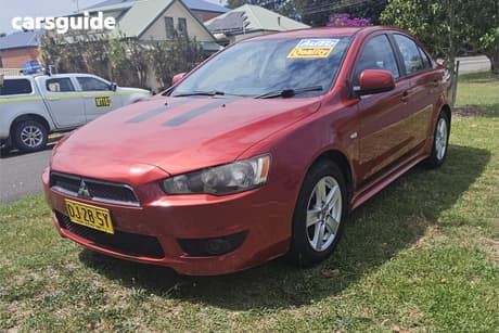 Red 2007 Mitsubishi Lancer Sedan Vr