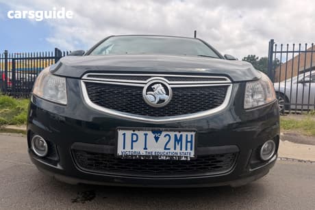 Green 2013 Holden Cruze Sedan Equipe