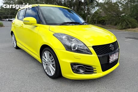 Yellow 2014 Suzuki Swift Hatchback Sport