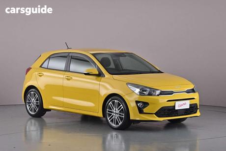 Yellow 2023 Kia RIO Hatchback Sport