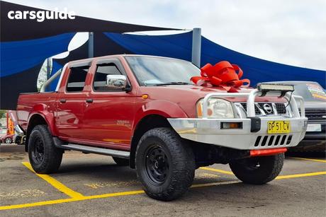 Red 2009 Nissan Navara Dual Cab Pick-up St-R (4X4)