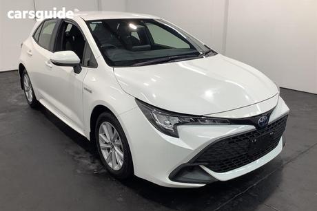 White 2023 Toyota Corolla Hatchback Ascent Sport + Conv Pk Hybrid