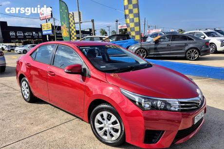 Red 2016 Toyota Corolla Sedan Ascent