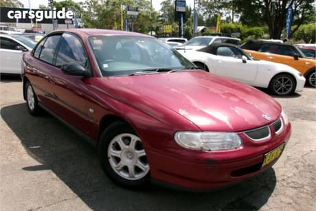Red 2000 Holden Commodore Sedan Executive