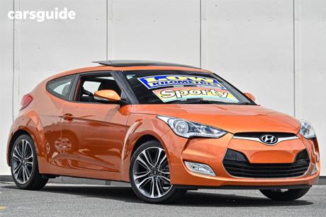 Orange 2015 Hyundai Veloster Coupe +