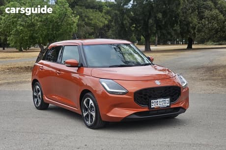 Orange 2025 Suzuki Swift Hatchback Hybrid Glx