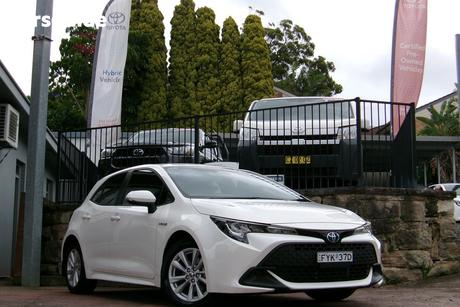 White 2023 Toyota Corolla Hatchback Ascent Sport Hybrid